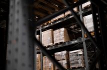 warehouse with stacked pallets and boxes