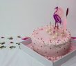 pink cake with flamingo recoration