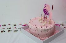 pink cake with flamingo recoration