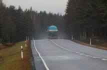 truck on road on rainy day