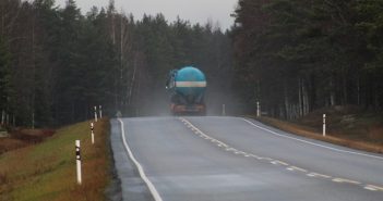 truck on road on rainy day