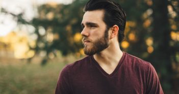man with dark hair and dark beard