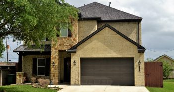 home with brown roof and garage door