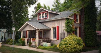 small house with red shutters