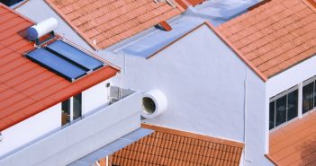 tiled roofs on white houses
