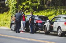 drivers and police at scene of car accident