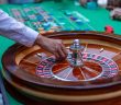 roulette table with dealer hand