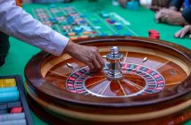 roulette table with dealer hand
