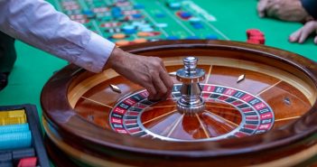 roulette table with dealer hand