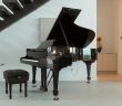 piano in home near stairs