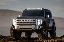 gray Hyundai Boulder Concept SUV front angle view with lights on