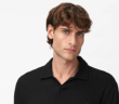 man in black polo shirt
