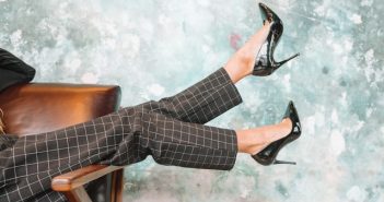 close-up of woman's black heels