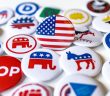 political buttons spread out on table