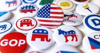 political buttons spread out on table