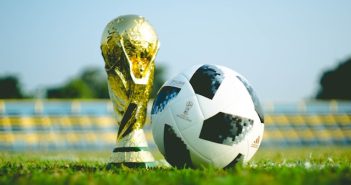 world cup trophy and soccer ball