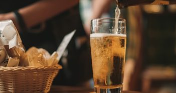 pouring beer into a glass