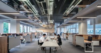 office workers in large office area