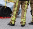 closeup of legs of firefighters at accident scene