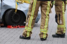 closeup of legs of firefighters at accident scene