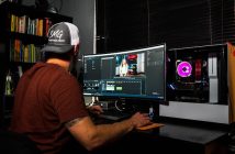 man working with video editing software