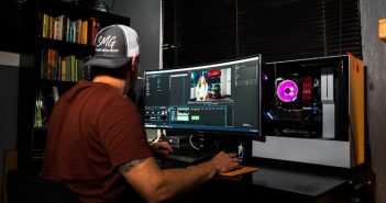 man working with video editing software