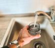 getting glass of water from faucet