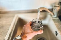 getting glass of water from faucet