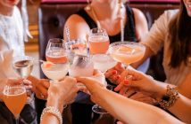 women doing toast with cocktails