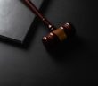 wooden gavel and book