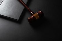 wooden gavel and book