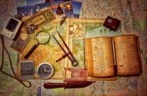 brown wooden scissors and book