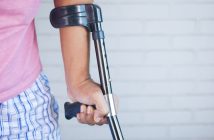 close-up of arm in crutches