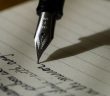writing on paper with a fountain pen