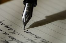 writing on paper with a fountain pen