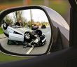 car accident in rear-view mirror