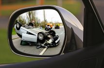 car accident in rear-view mirror