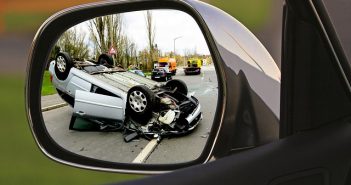 car accident in rear-view mirror