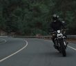 man on motorcylcle on road