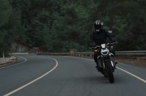 man on motorcylcle on road