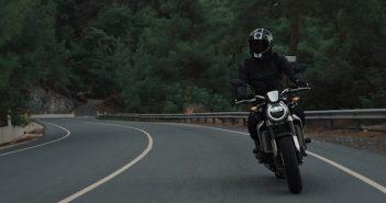 man on motorcylcle on road