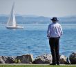 man looking at water