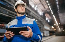 man in hardhat on factory floor
