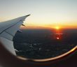 view of sunrise from plane window