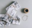 wrapped gift boxes and string