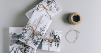 wrapped gift boxes and string