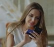 pretty woman using smartphone apps