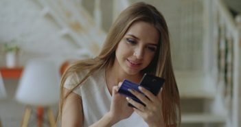 pretty woman using smartphone apps