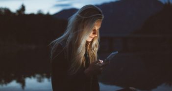 woman holding smartphone