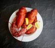 lobster dinner with lemons